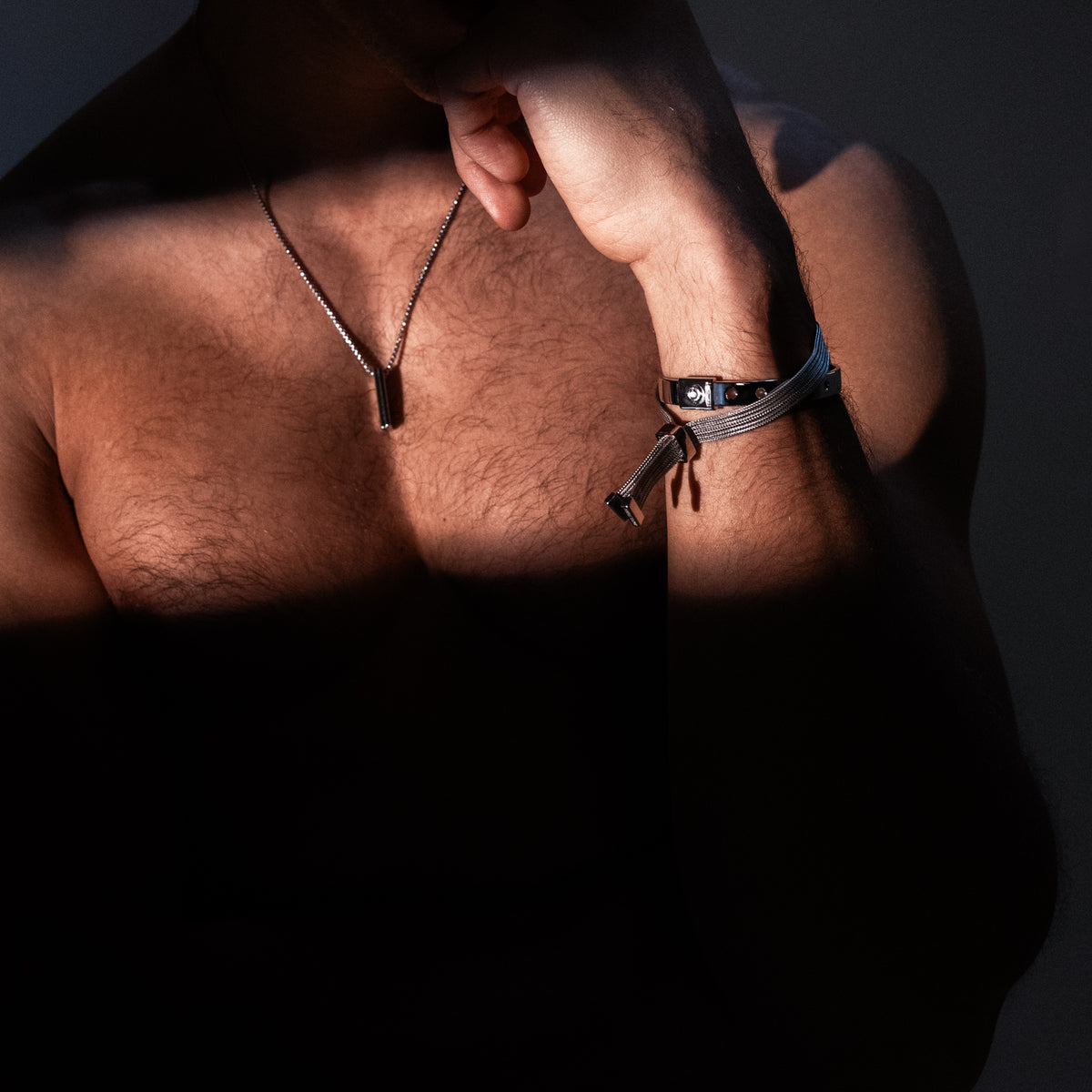 silver cuff bracelet on male model