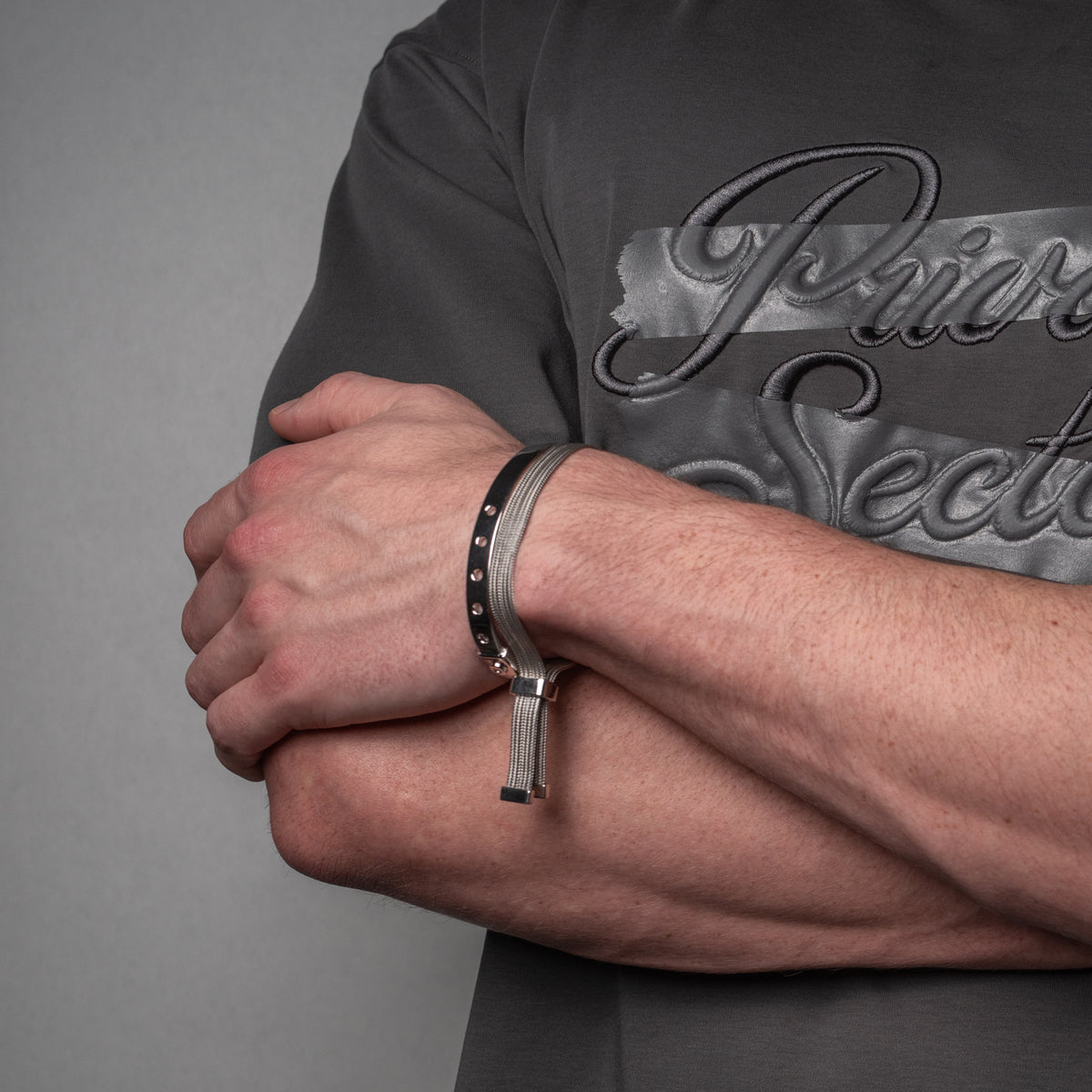 silver cuff bracelet on male model