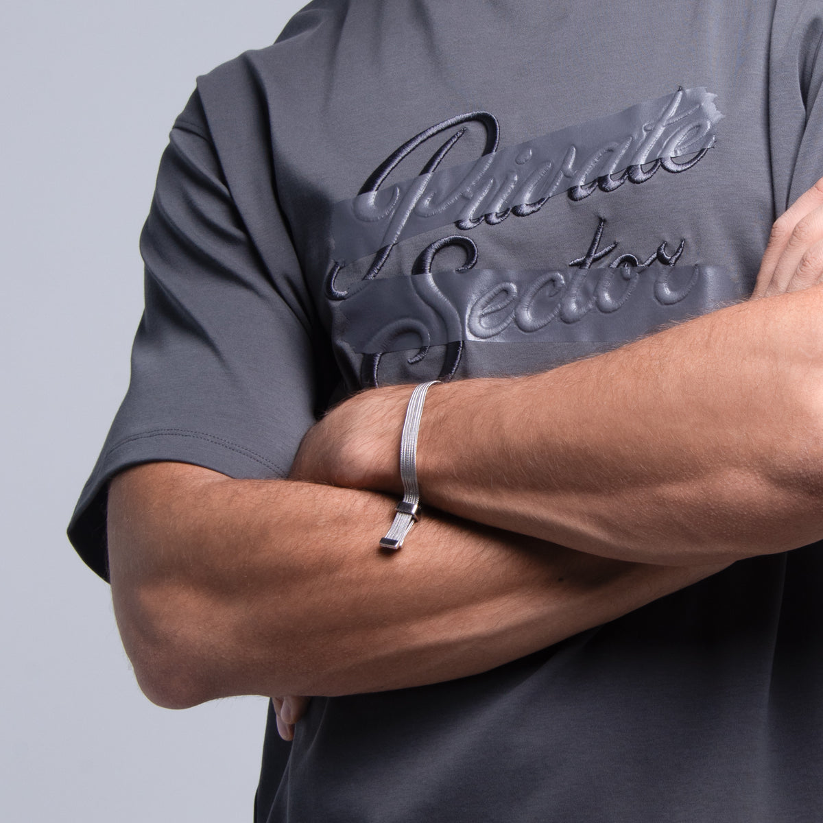 silver mesh bracelet on male model