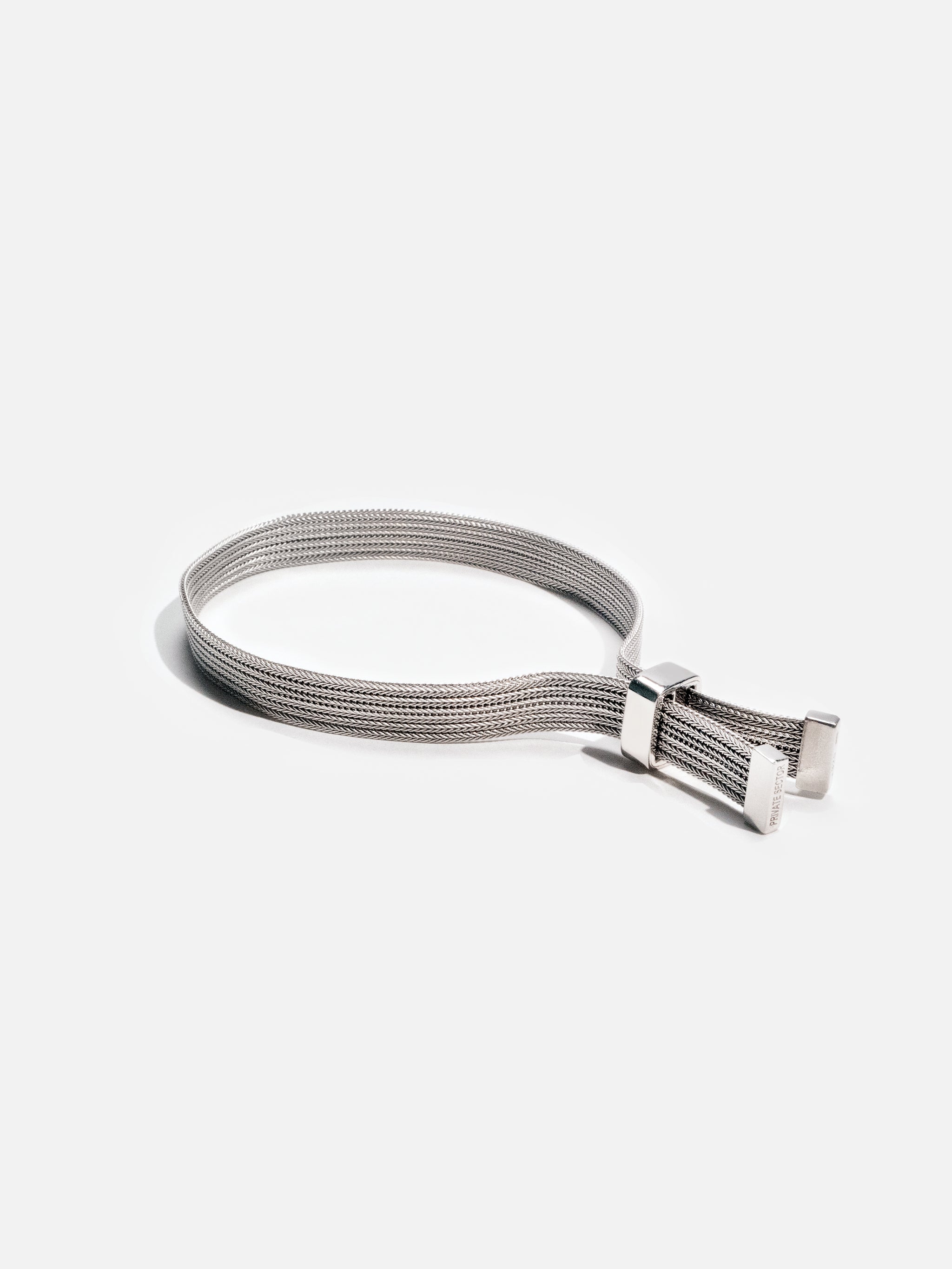 silver mesh bracelet with adjustable clasp on white background