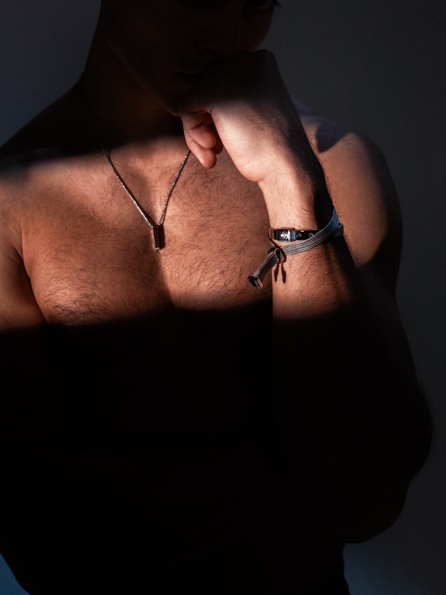silver mesh bracelet on male model