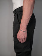 silver bracelet on a model's wrist