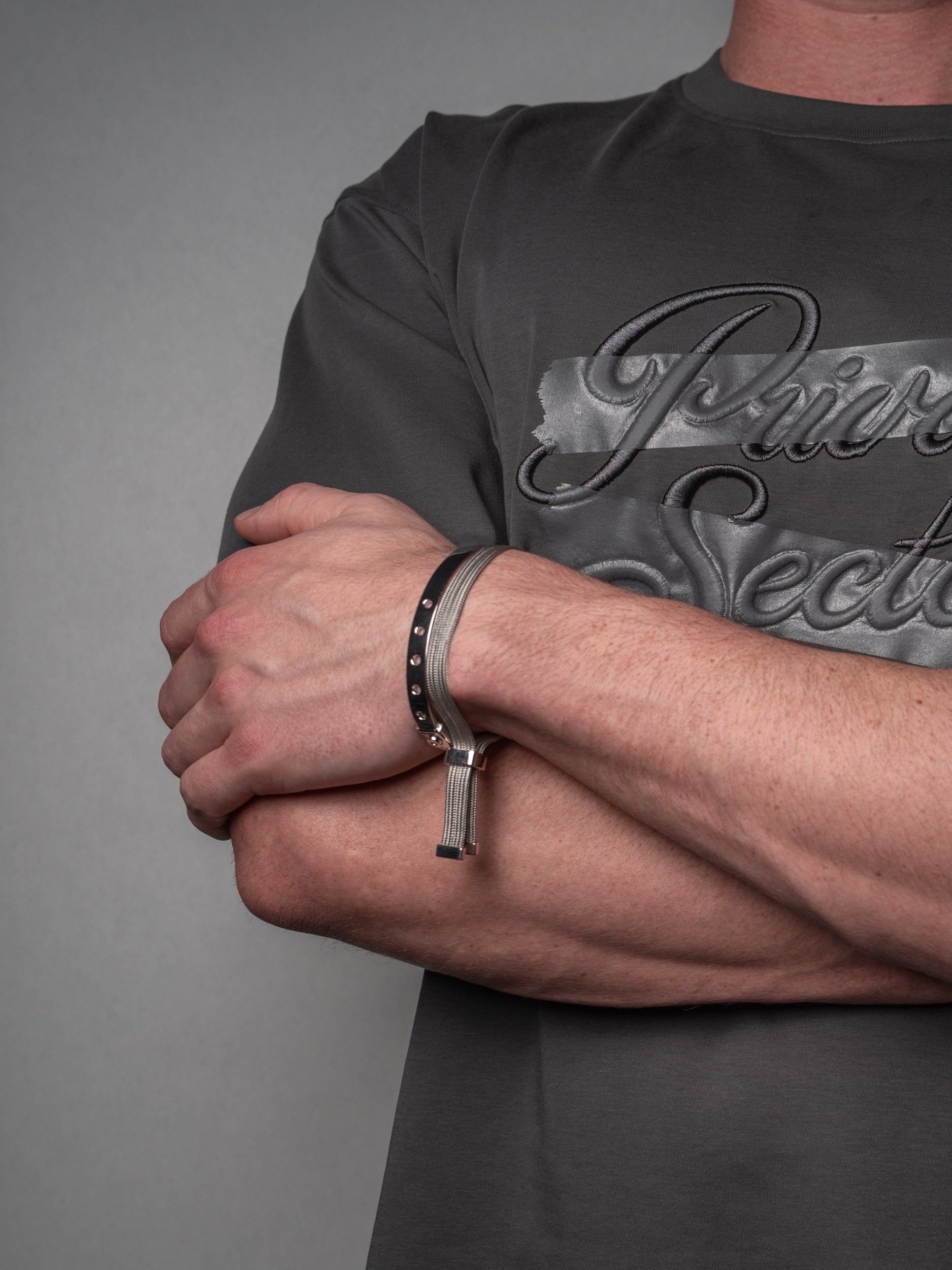 silver cuff bracelet on male model