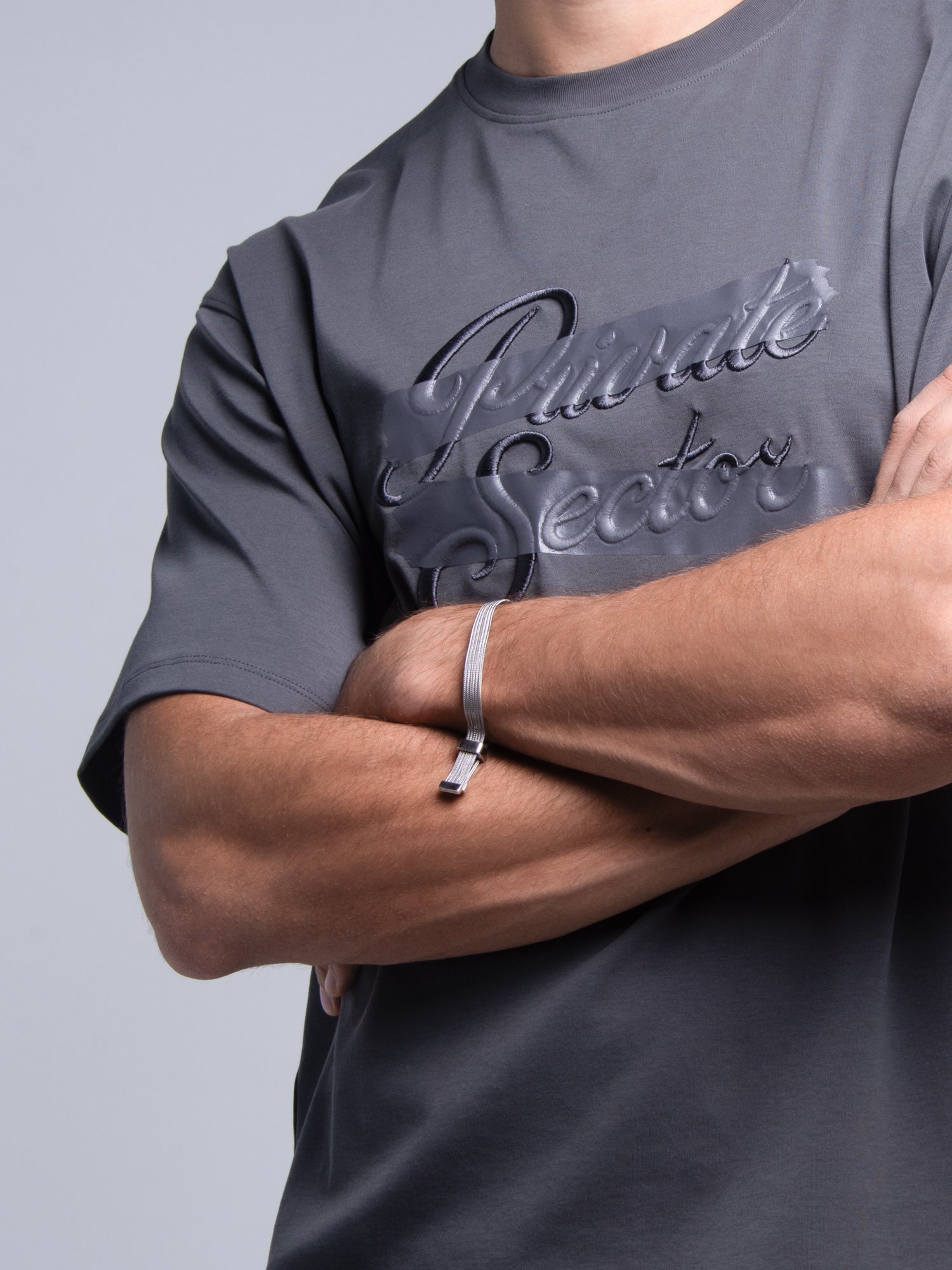 silver mesh bracelet on male model