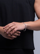silver chain bracelet on male model
