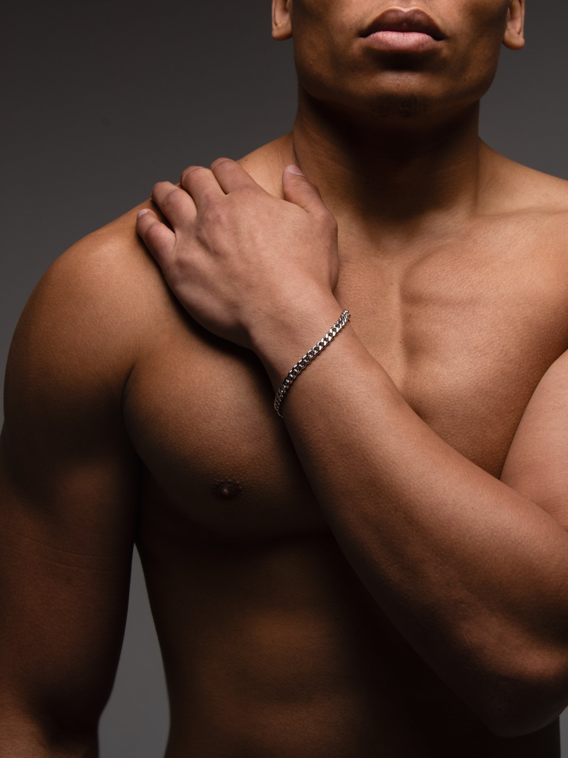 silver chain bracelet on male model